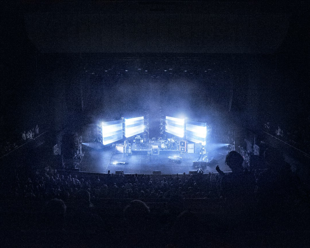 Stage with large illuminated screens and lights